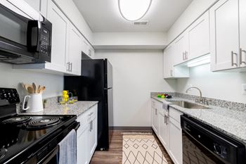 Fully Equipped Kitchen Includes Frost-Free Refrigerator, Electric Range, & Dishwasher at Steeplechase at Shiloh Crossing, Indiana, 46123